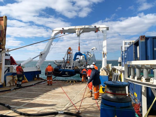 divers working on grace hopper subsea cable installation